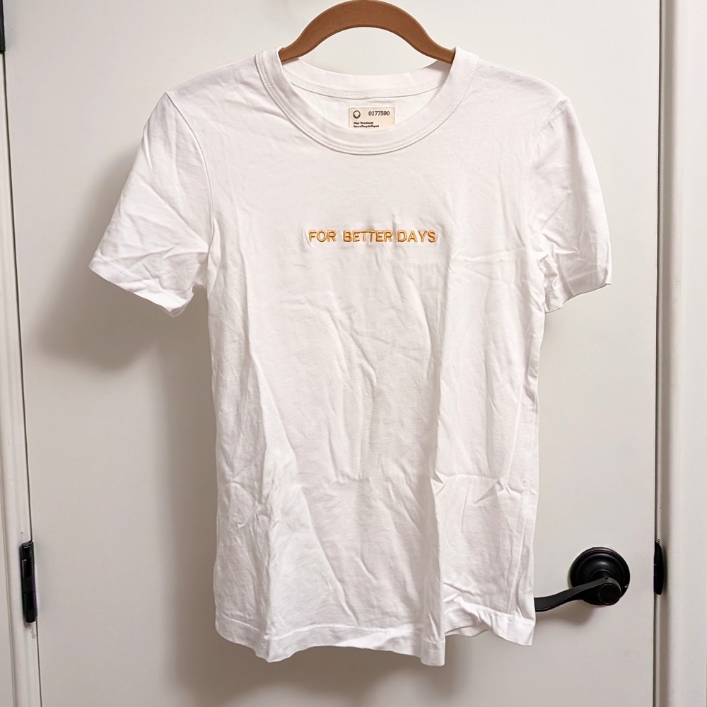 White T-Shirt with Orange Text